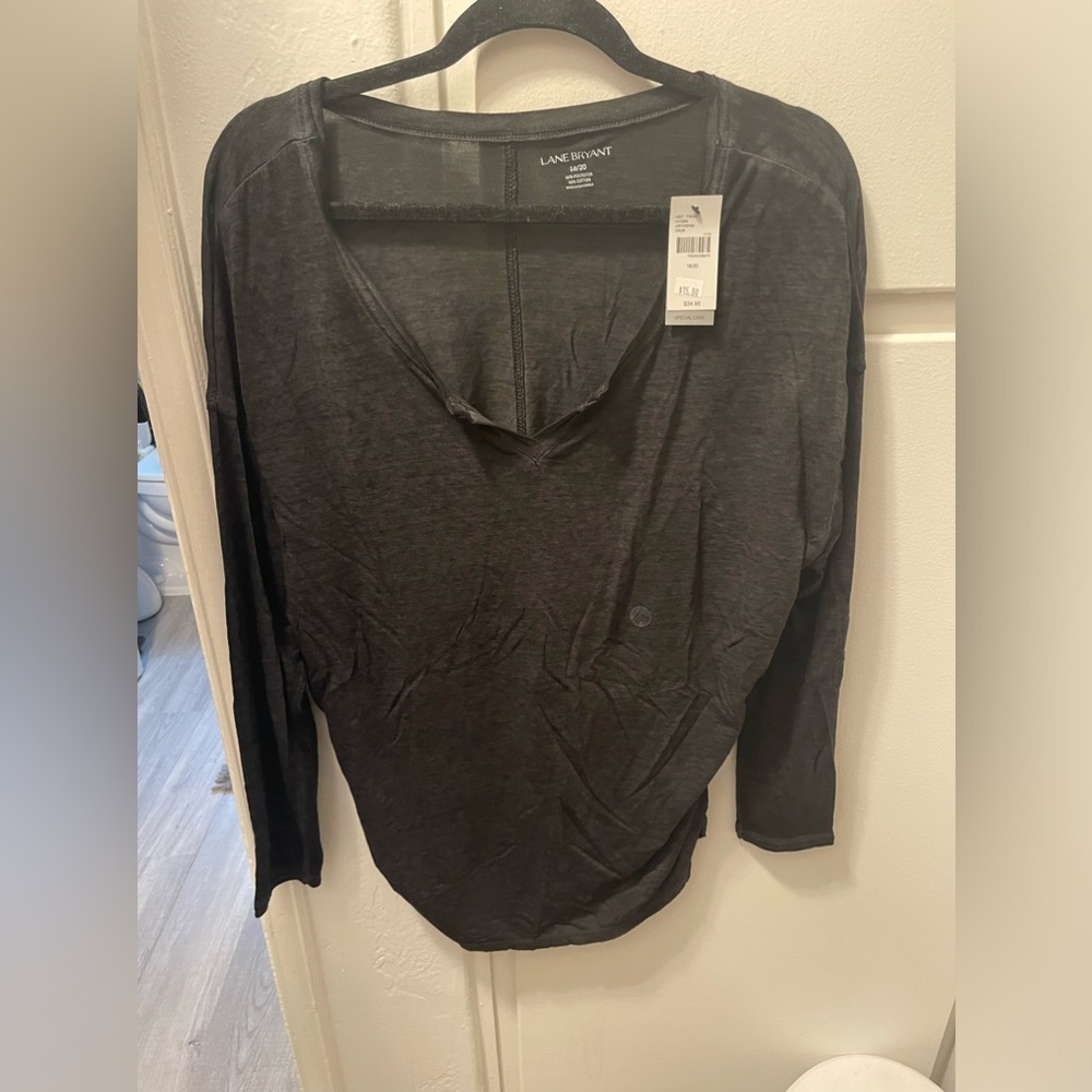 Black long Sleeve top with side gathering on both sides